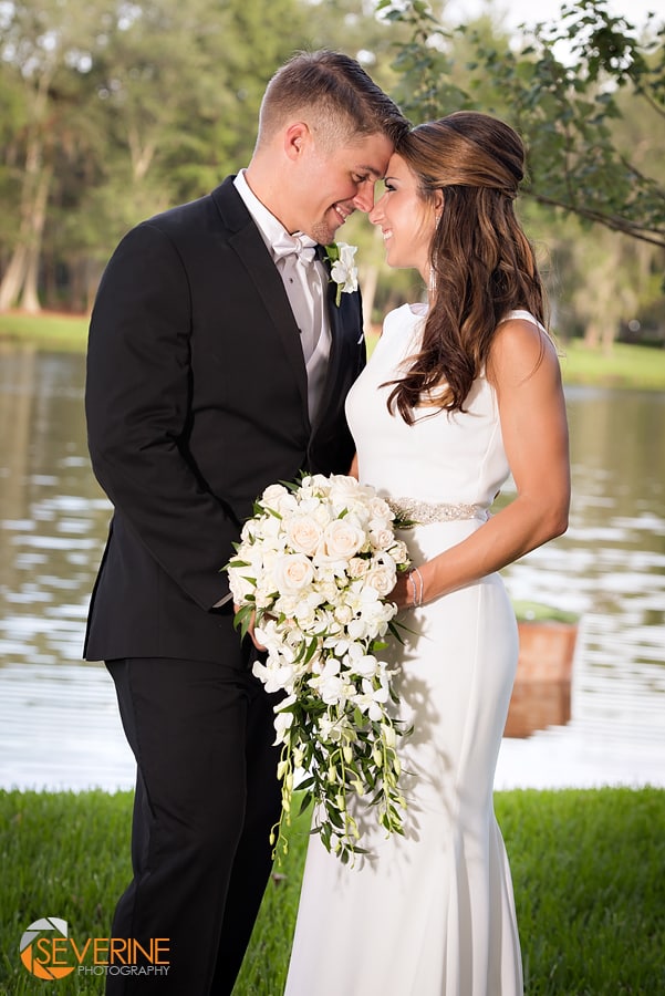 couple photos by fountain in sawgrass